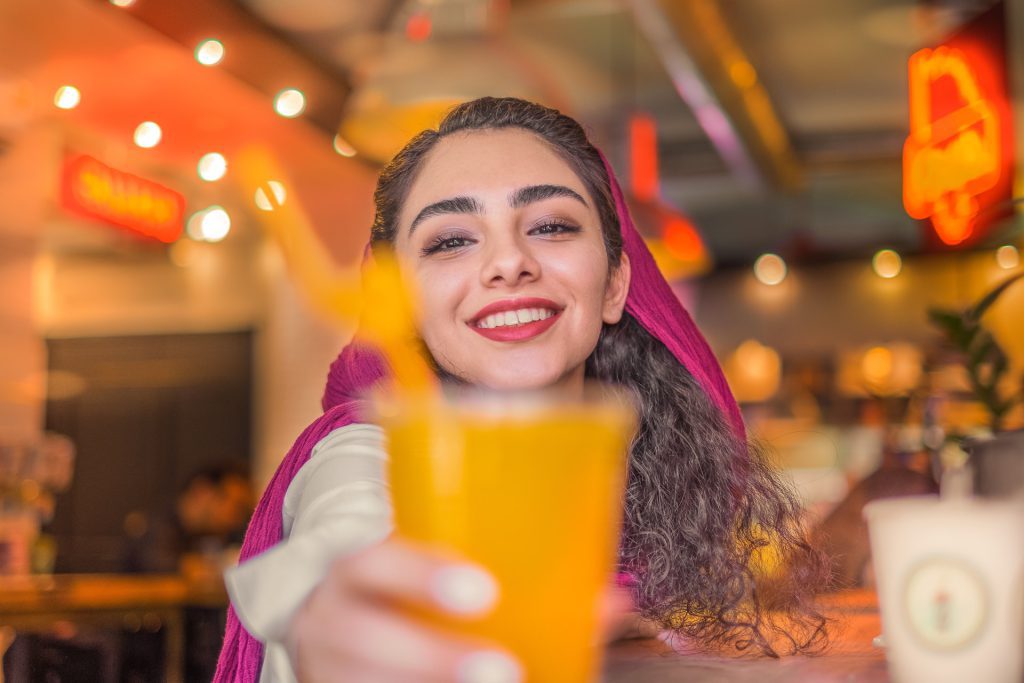 ToIranTour-Iran-Hospitality-Girl-offering-Juice-Tehran