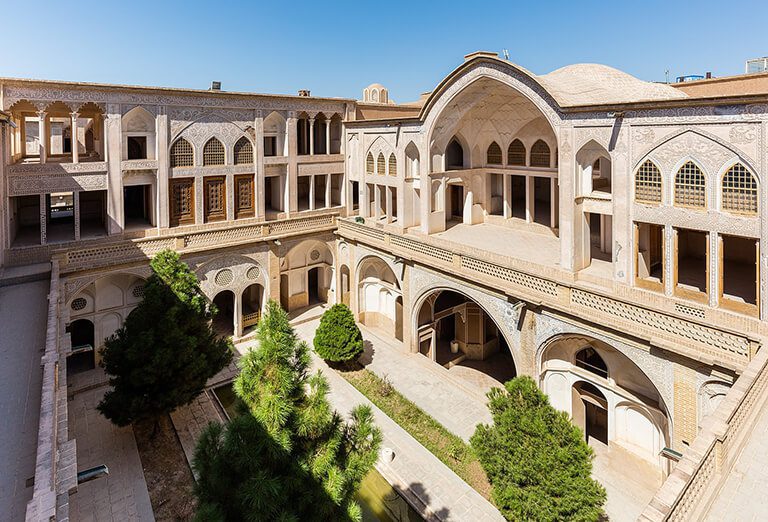 An exterior view of the Abbāsi House and its central courtyard, Kashan