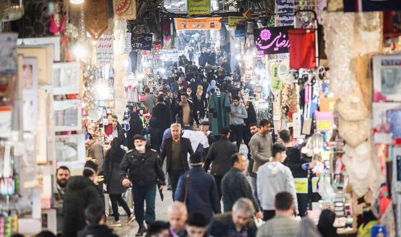 people walking in tehran grand bazaar-iranian desserts