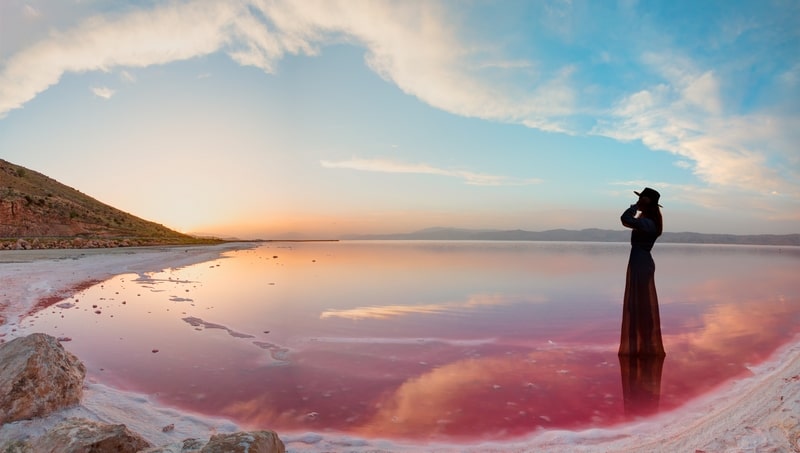 ToIranTour - A woman in Maharlu Lake also known as Pink Lake in Shiraz - Iran Nature Tour