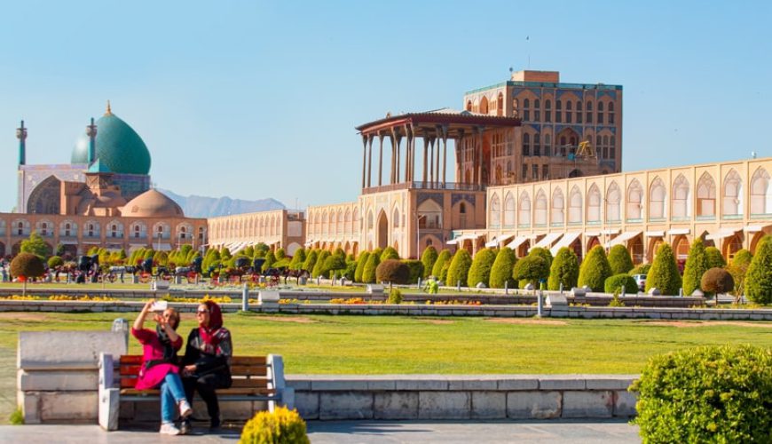 ToIranTour - Two women taking selfies in Naghsh-e Jahan Square - Isfahan - Iran Classic Tour